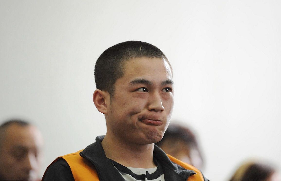 高空抛物致死案嫌犯获死刑后露出笑容，法律严惩与道德反思的交织